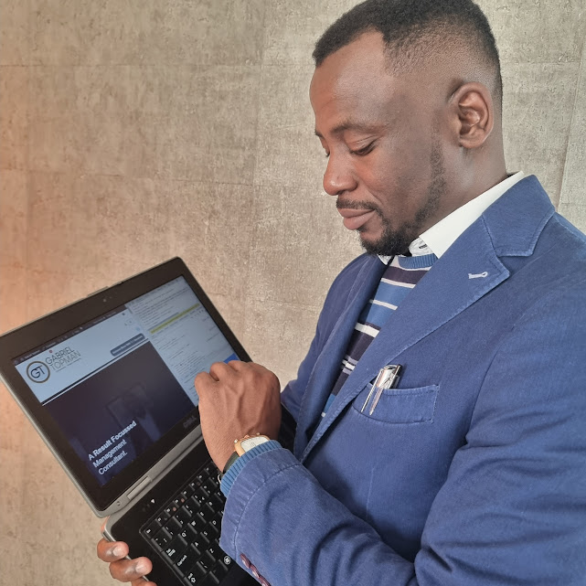 Gabriel Topman working on a laptop